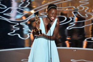 Actress Lupita Nyong'o accepts the Oscar for supporting actress for her role in "12 Years a Slave."  (Kevin Winter / Getty Images / March 2, 2014) 