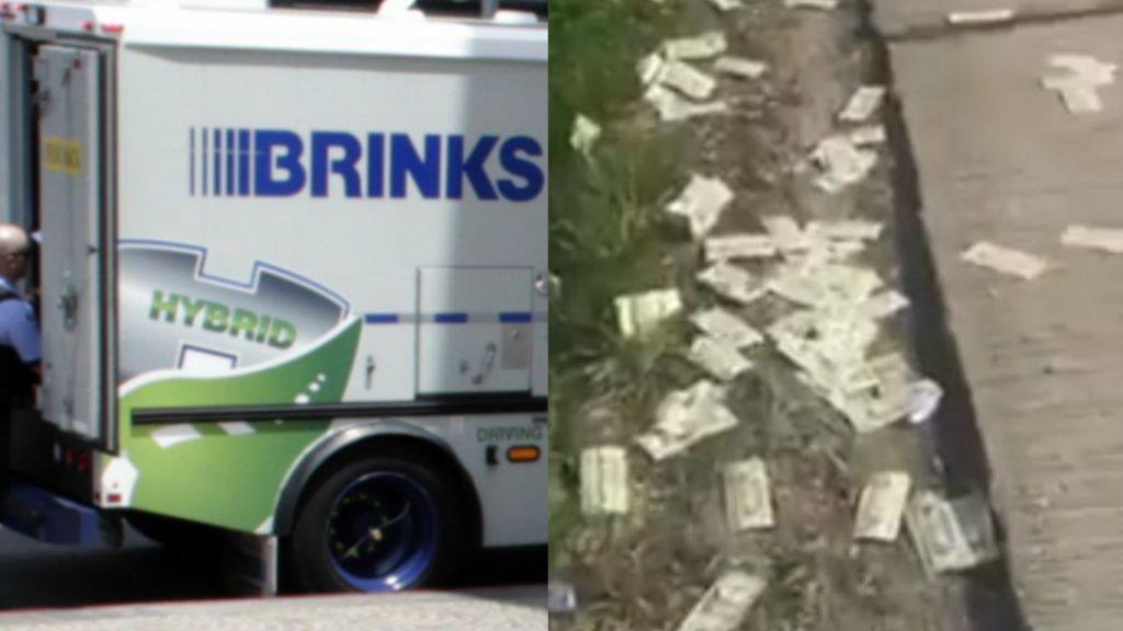 Money flies out of Bank Truck to a Highway in America.  የኢንዲያና ነዋሪዎች መንገድ ላይ የተበተነ ገንዘብ ሲለቅሙ ዋሉ